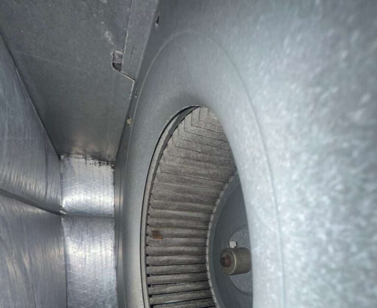Centrifugal blower fan inside galvanized steel ductwork being cleaned in Hillsborough County FL